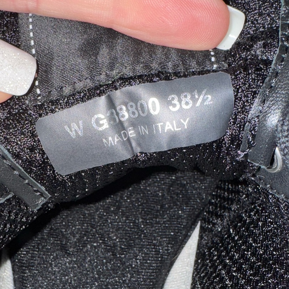 Authentic black and white Chanel sneakers.